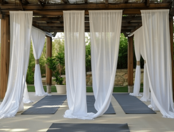 Pergola with outdoor curtains, durable fabric, privacy adjustment, sun protection