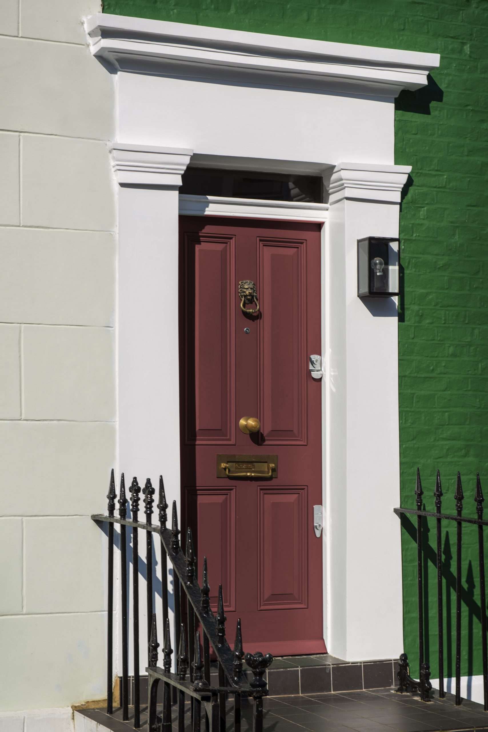 side-view-front-door-with-beige-green-wall
