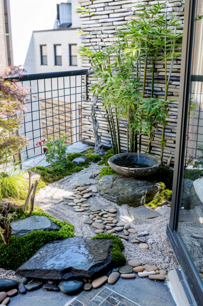 Japanese garden balcony, bamboo plants, stone pathways, Japanese maple, moss, stone bowl water feature...