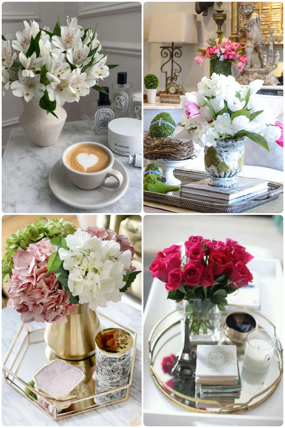 A marble table features a vase of white lilies and a latte with heart design candles; a nearby arrangement shows pink and white flowers in a decorative pot atop books